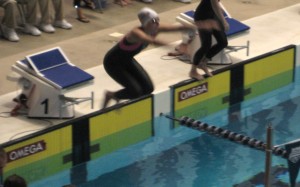 Lara jumps into the pool for the 100m Backstroke.